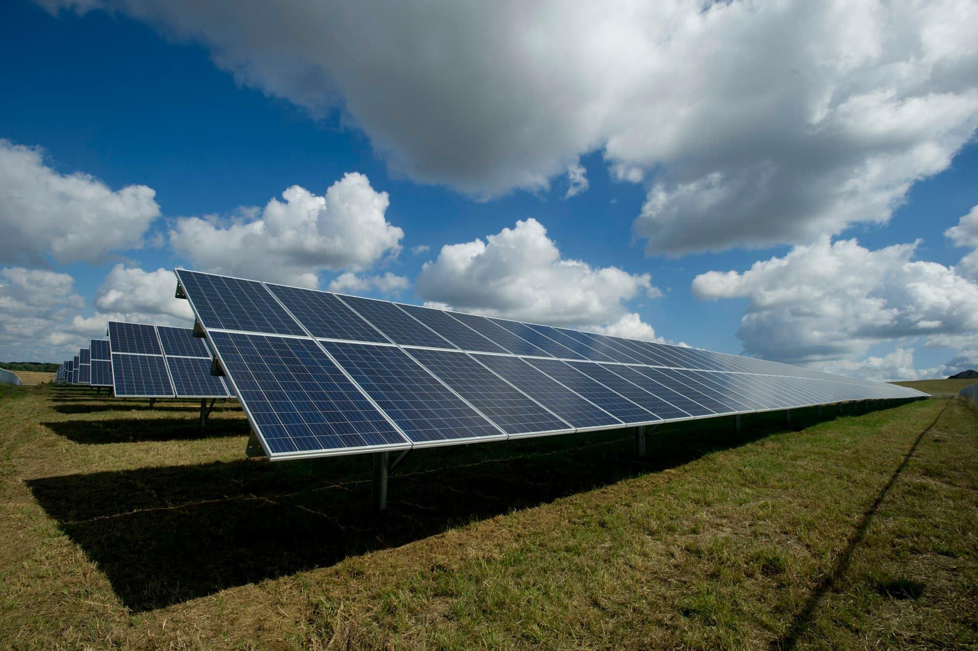 Texas home with rooftop solar and battery storage at dusk